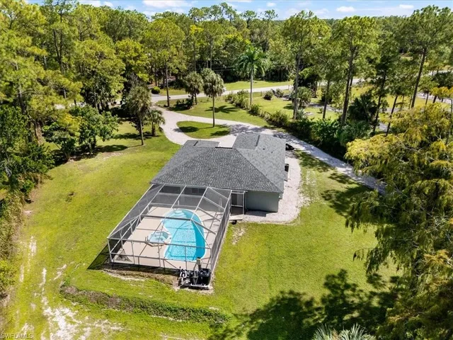 a view of a swimming pool with an outdoor space