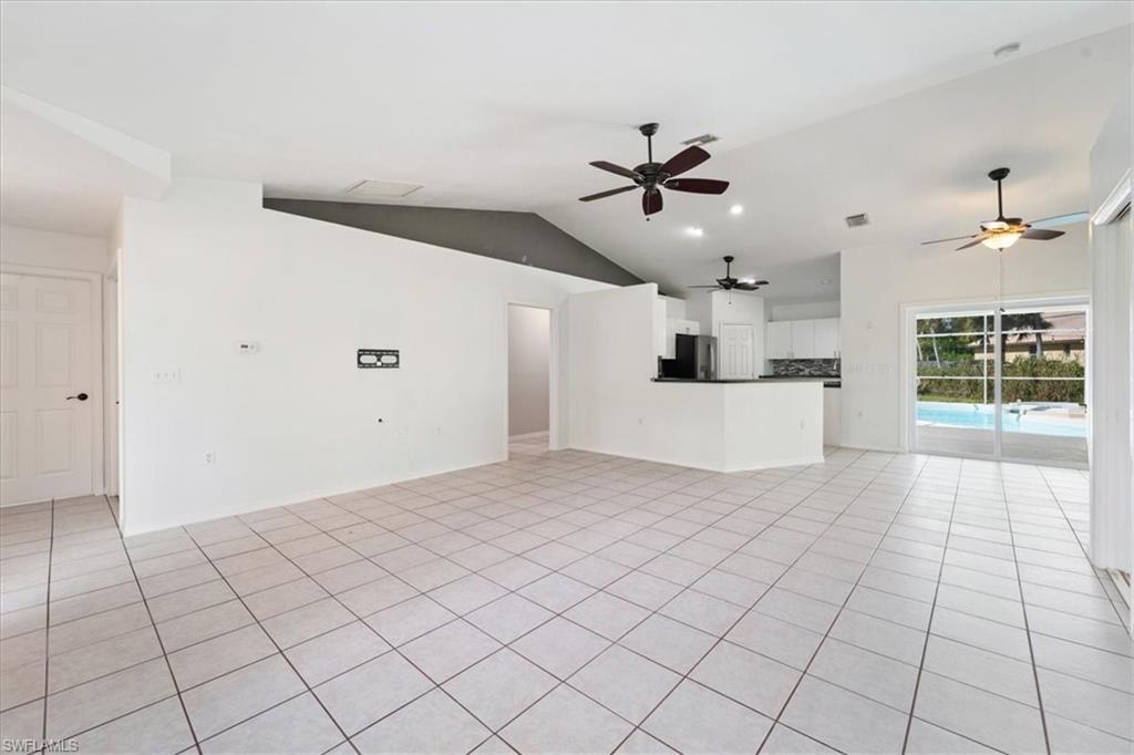 1161 25th Street Southwest Naples, FL 34117 - Photo 5 of 23 a view of a livingroom with a ceiling fan and window