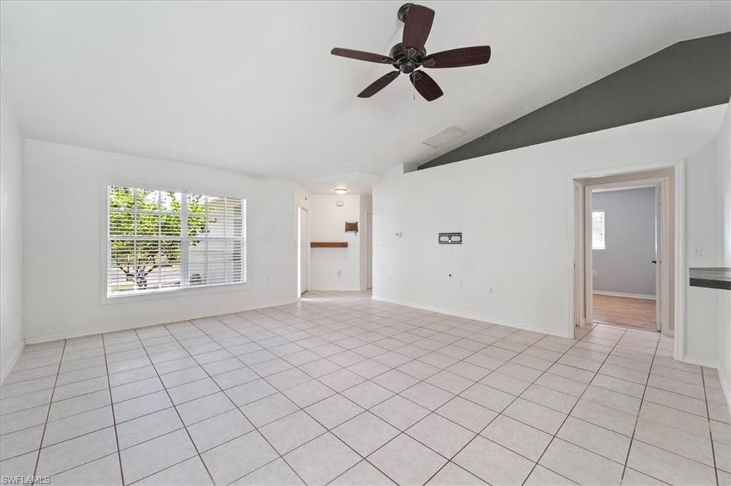 1161 25th Street Southwest Naples, FL 34117 - Photo 7 of 23 a view of an empty room and window