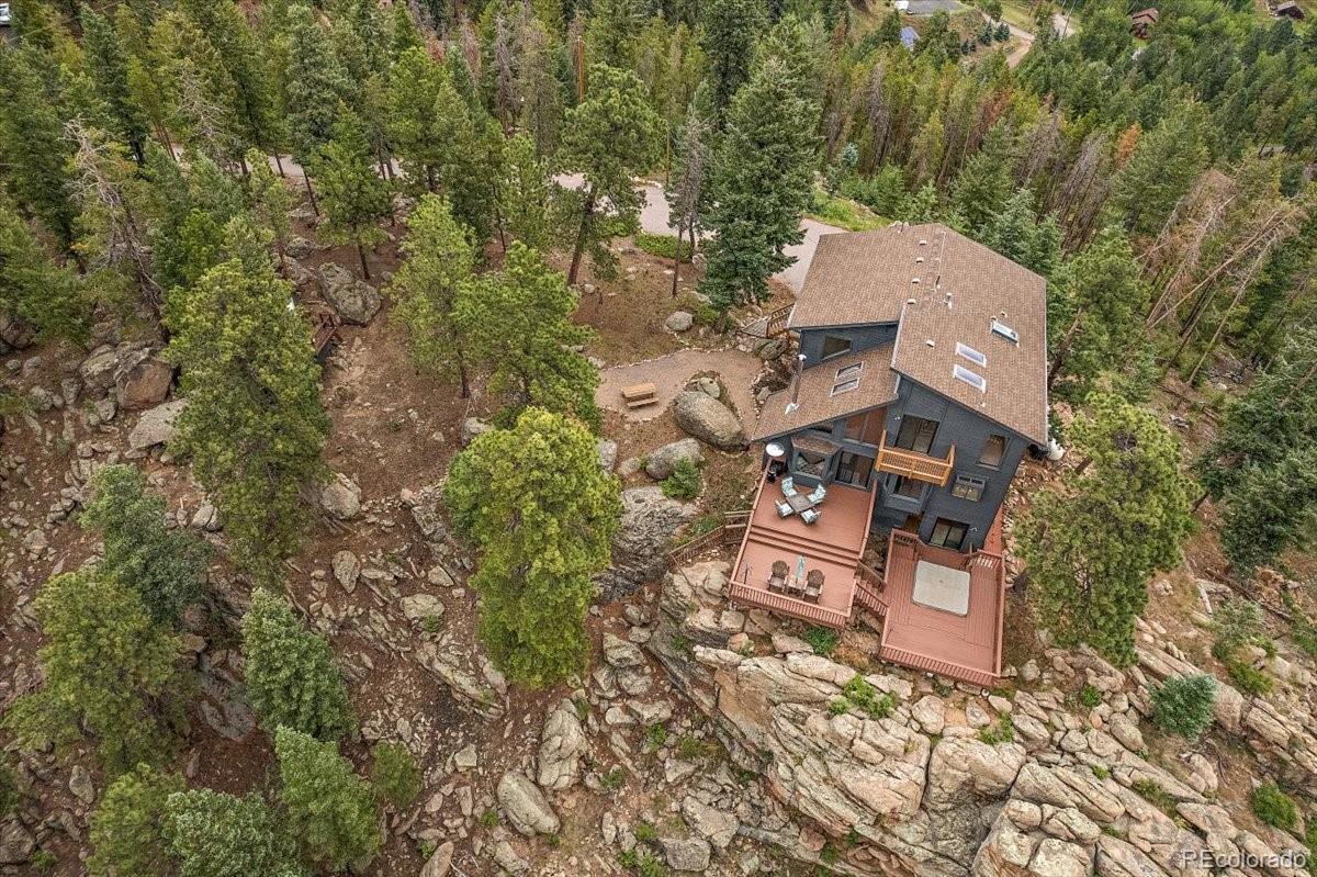 32482 Lodgepole Drive Evergreen, CO 80439 - Photo 39 of 40 an aerial view of a house with a yard