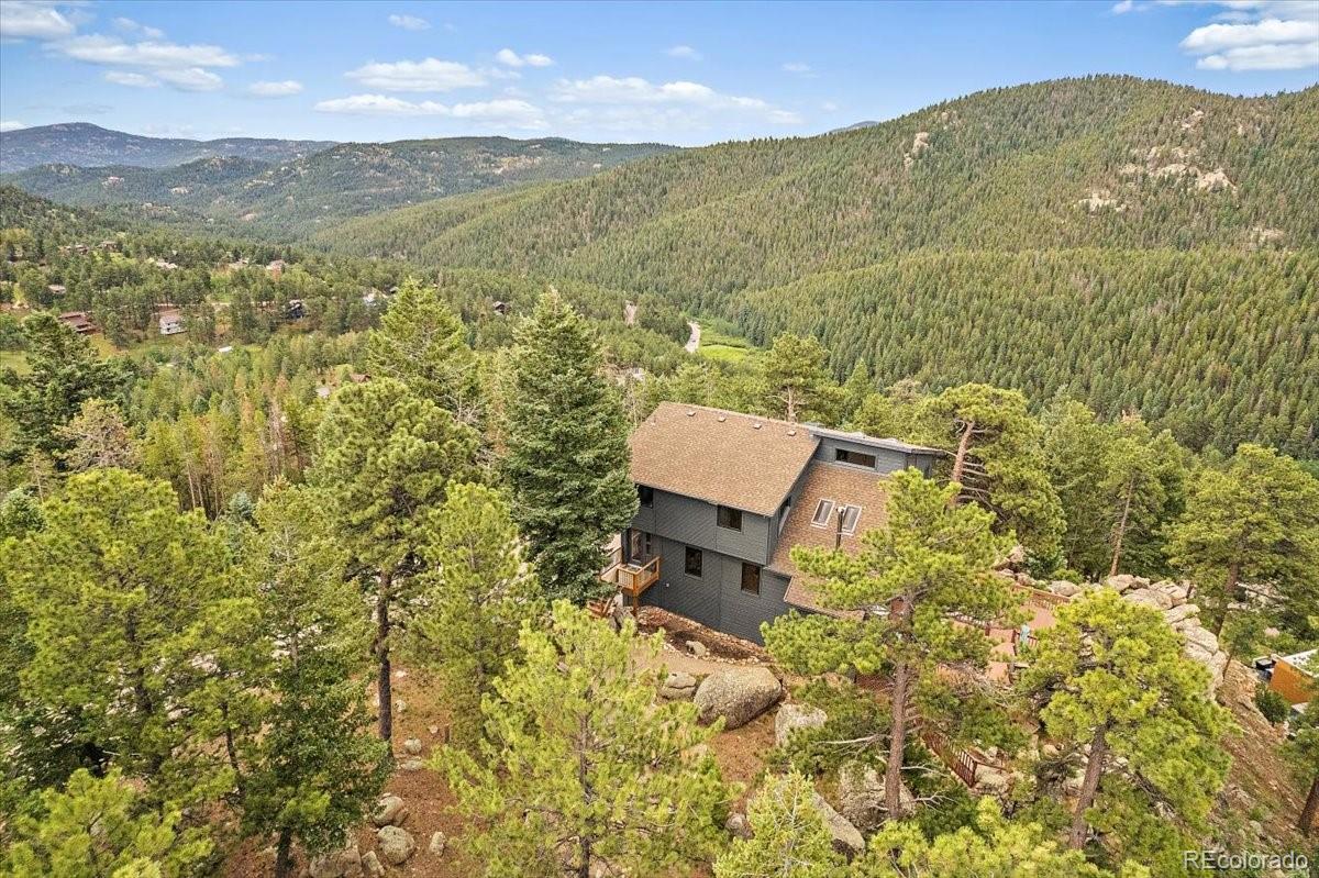 32482 Lodgepole Drive Evergreen, CO 80439 - Photo 40 of 40 a view of a lake with a mountain