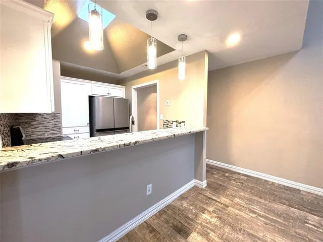 a view of a sink and a mirror