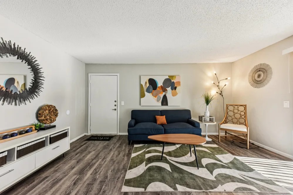 2501 Wickersham Lane, Unit 2612 Austin, TX 78741 - Photo 6 of 12 a living room with furniture and a table