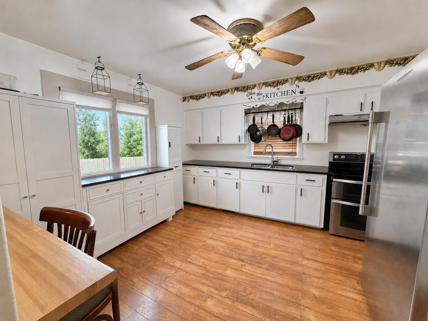 214 South 65th Street Milwaukee, WI 53214 - Photo 9 of 29 Spacious kitchen with plenty of counter space and open to separate dinette and breakfast bar. Some photos may include virtually staging and or digital enhancements.