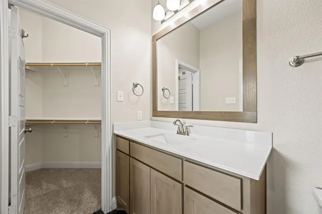 a bathroom with a shower and toilet