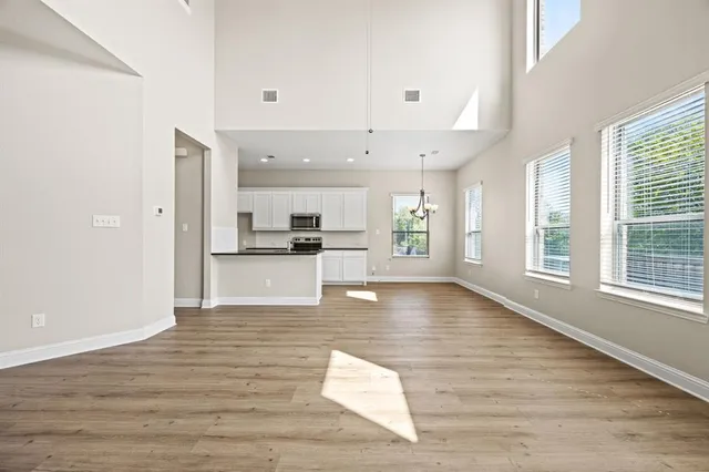 a view of kitchen with wooden floor
