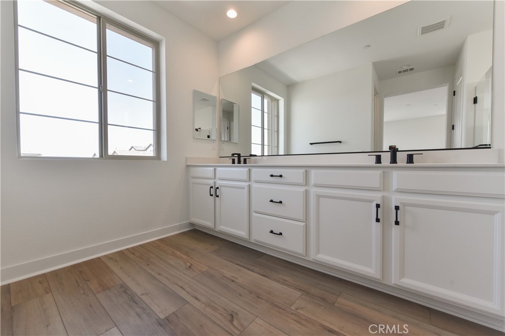 162 Pattern Irvine, CA 92618 - Photo 25 of 39 a room with a sink cabinets and a window