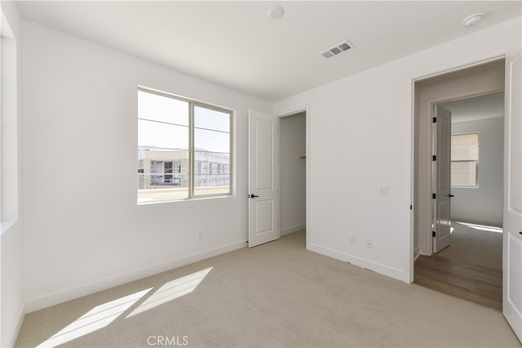 162 Pattern Irvine, CA 92618 - Photo 35 of 39 a view of an empty room with a window