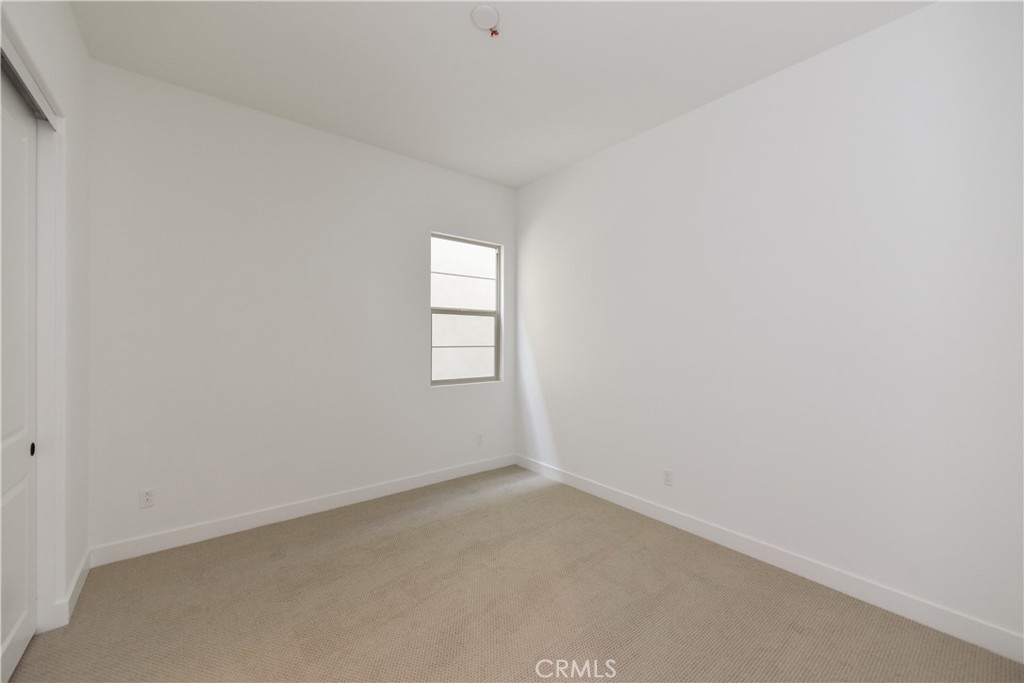 162 Pattern Irvine, CA 92618 - Photo 7 of 39 an empty room with windows