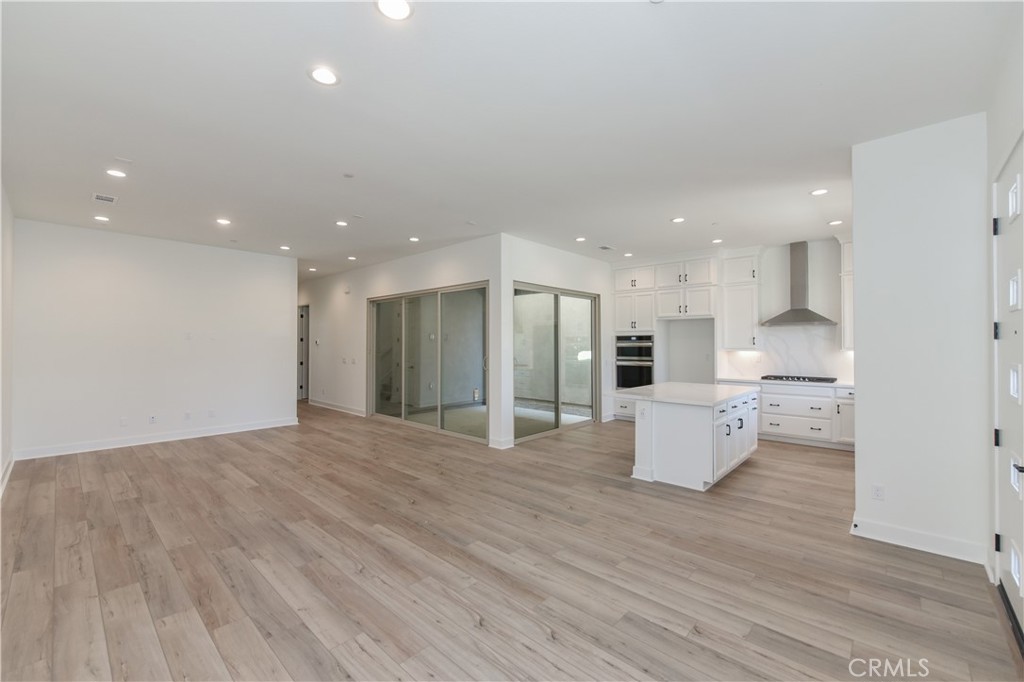 162 Pattern Irvine, CA 92618 - Photo 9 of 39 a view of kitchen with stainless steel appliances refrigerator stove microwave and cabinets