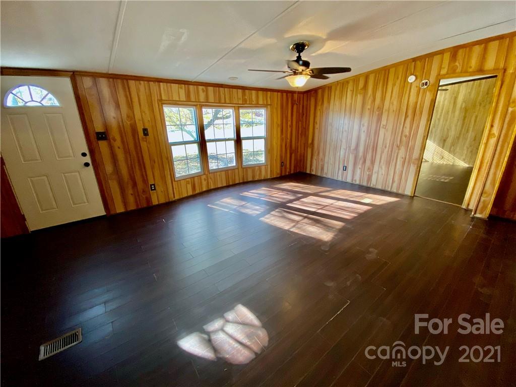 6102 Bill Sain Road Vale, NC 28168 - Photo 2 of 13 a view of entryway with wooden floor