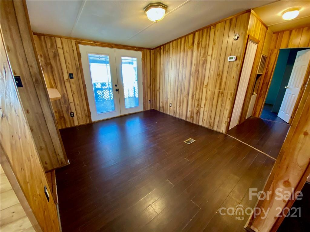 6102 Bill Sain Road Vale, NC 28168 - Photo 11 of 13 wooden floor in an empty room with a window