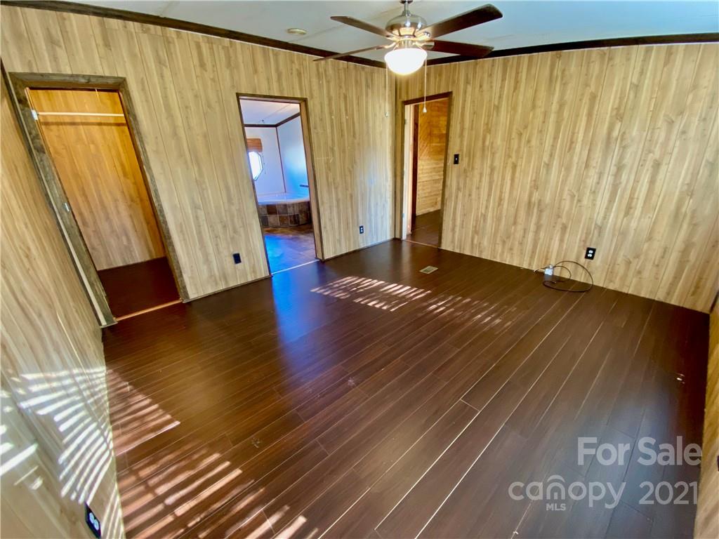 6102 Bill Sain Road Vale, NC 28168 - Photo 7 of 13 a view of a room with wooden floor and stairs