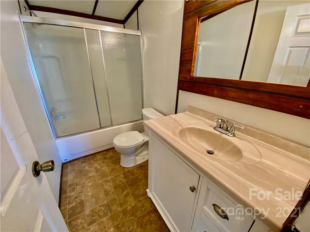 6102 Bill Sain Road Vale, NC 28168 - Photo 8 of 13 a bathroom with a sink and a mirror