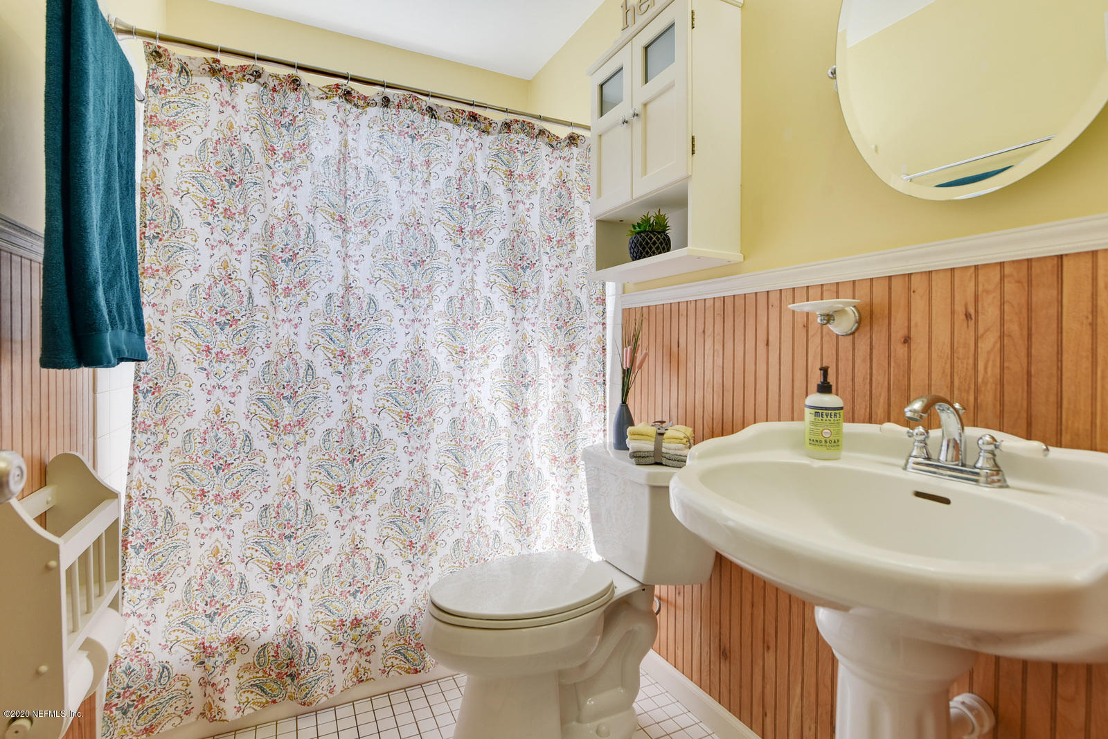2530 Summer Tree Road East Jacksonville, FL 32246 - Photo 20 of 28 a bathroom with a sink and a mirror