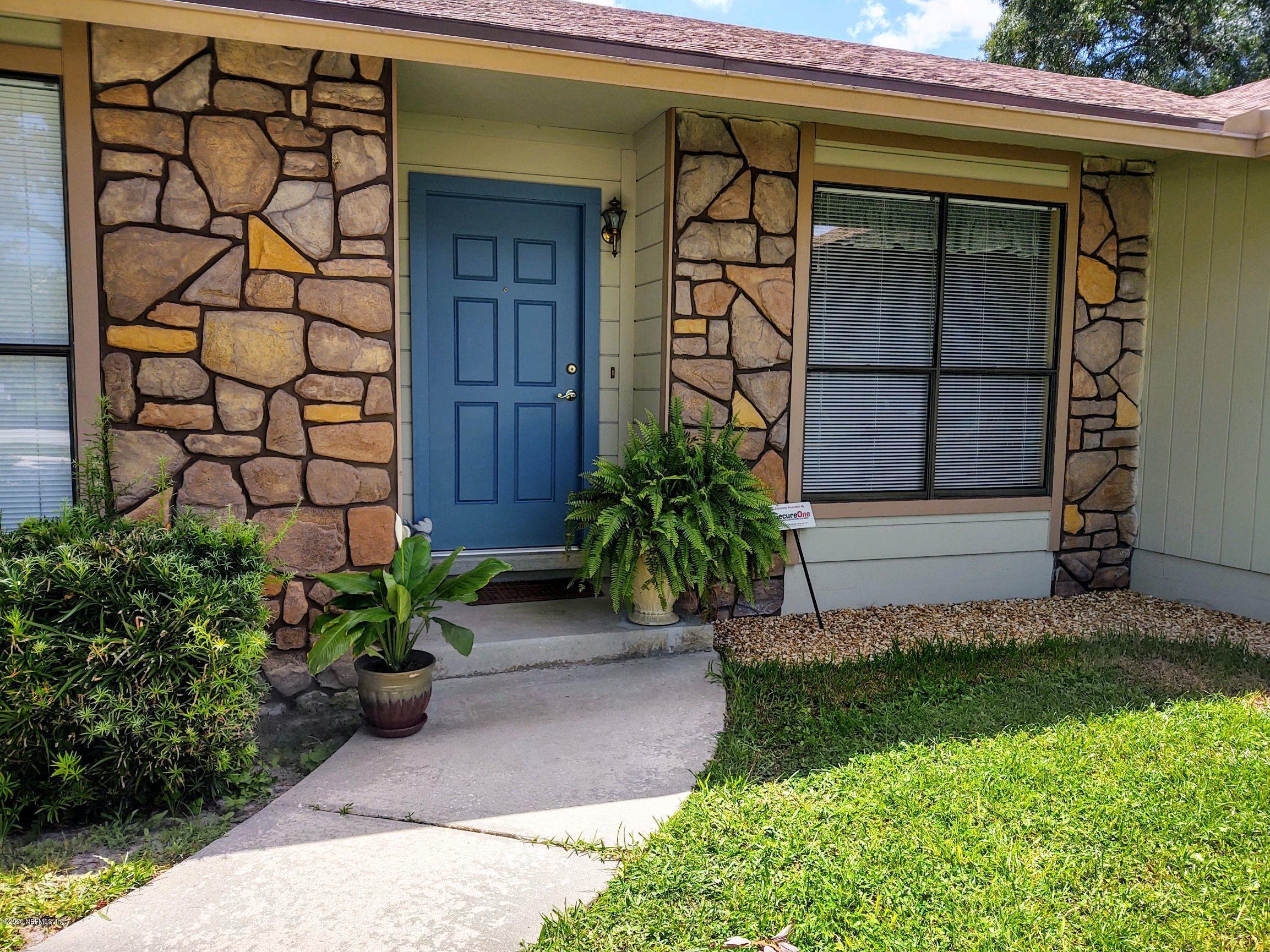 2530 Summer Tree Road East Jacksonville, FL 32246 - Photo 3 of 28 a front view of a house