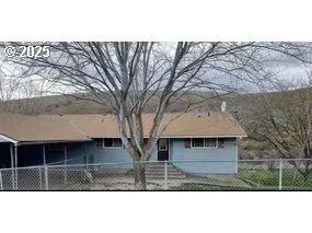 a view of house with outdoor space