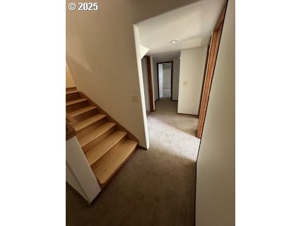 61476 Dee Cox Road Heppner, OR 97836 - Photo 23 of 43 a view of a hallway with staircase