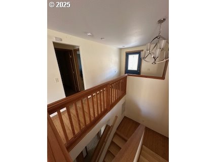 61476 Dee Cox Road Heppner, OR 97836 - Photo 25 of 43 a view of a hallway with staircase
