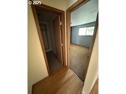 61476 Dee Cox Road Heppner, OR 97836 - Photo 26 of 43 a view of a hallway with wooden floor