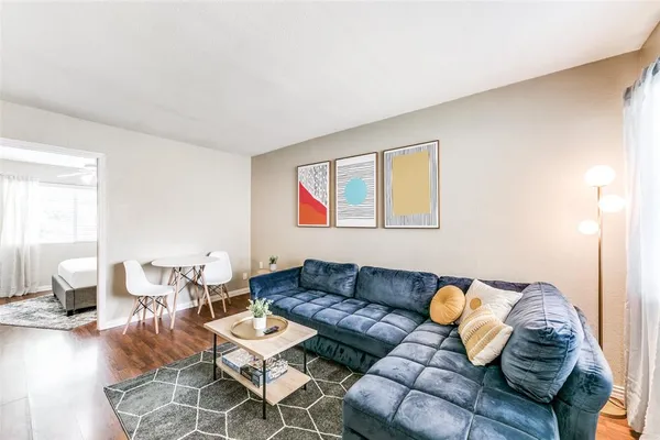 a living room with furniture and a couch