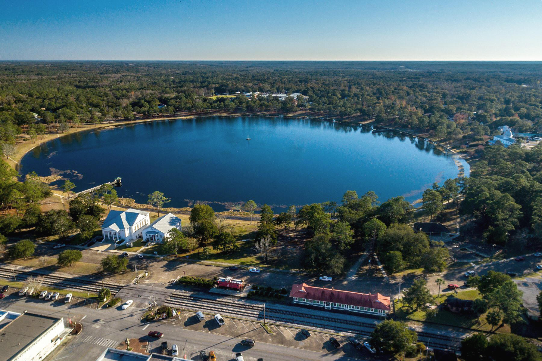 7-8 Tarpon Lane DeFuniak Springs, FL 32433 - Photo 14 of 18 an aerial view of a houses with a lake view