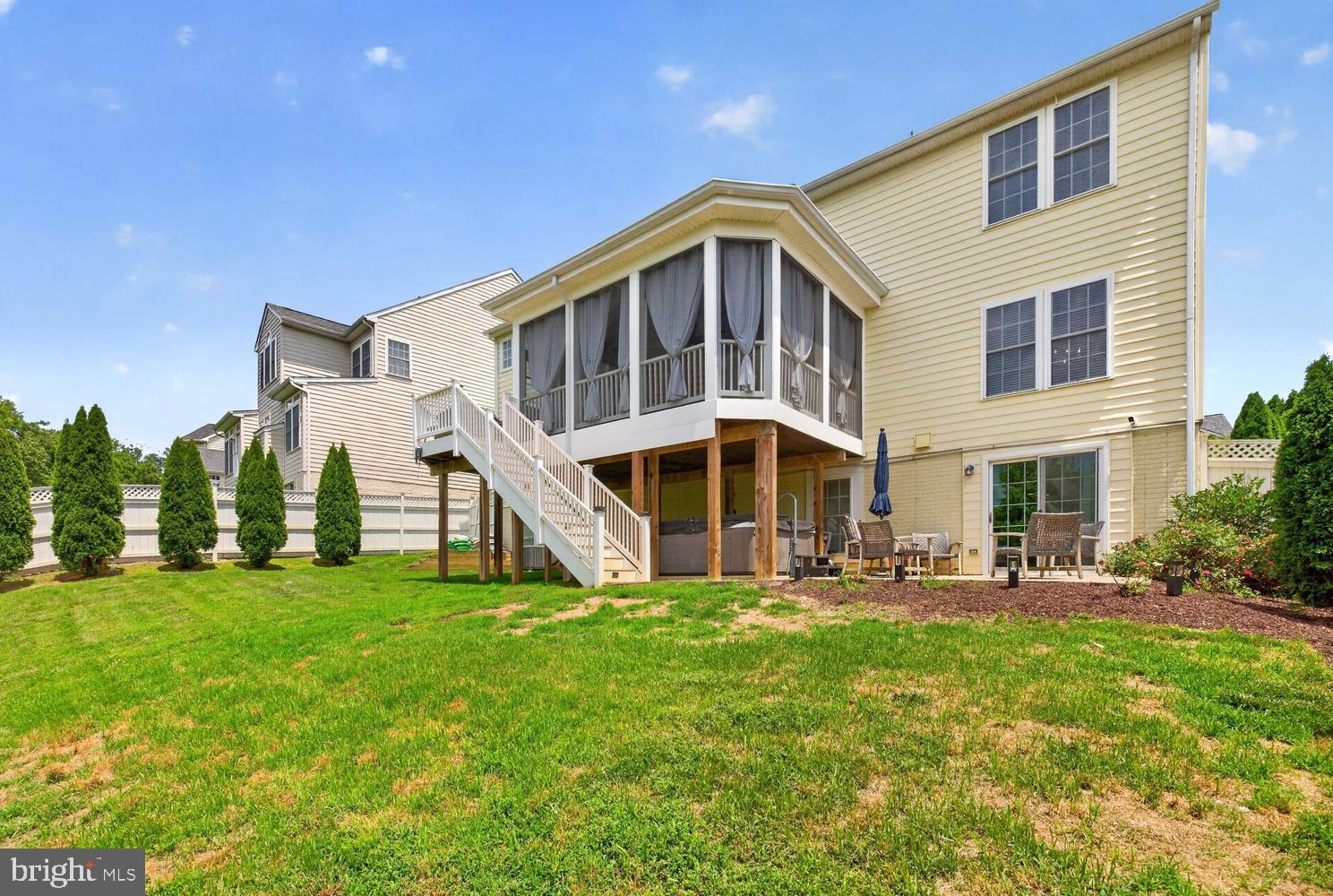 23106 Birch Mead Road Clarksburg, MD 20871 - Photo 45 of 60 a front view of house with yard and trees in the background