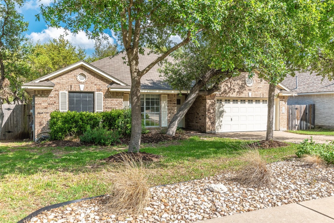 2210 Zoa Drive Cedar Park, TX 78613 - Photo 1 of 1 a big house with a big yard and large trees
