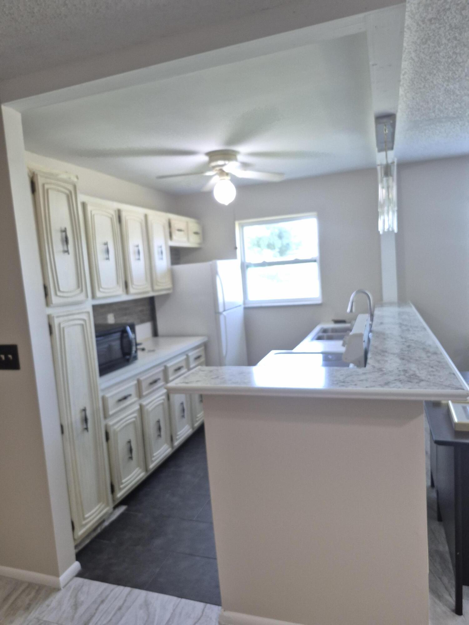 737 High Point Boulevard North, Unit B Delray Beach, FL 33445 - Photo 4 of 11 20250825_095749