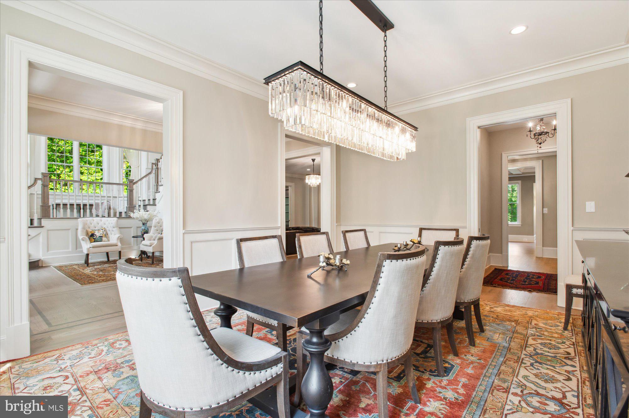 6804 Benjamin Street McLean, VA 22101 - Photo 14 of 68 a view of a dining room with furniture window and wooden floor