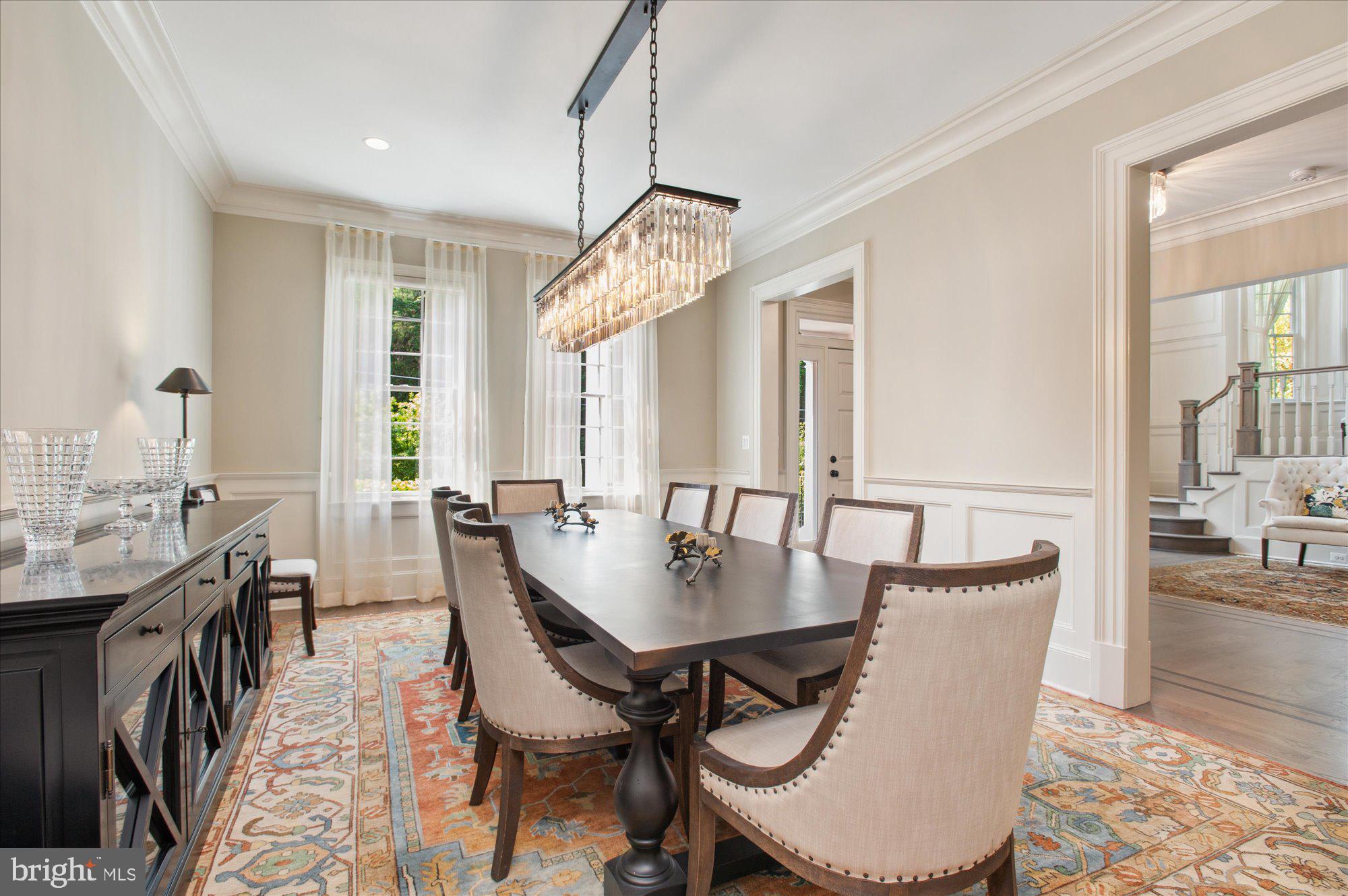 6804 Benjamin Street McLean, VA 22101 - Photo 15 of 68 a view of a dining room with furniture window and wooden floor