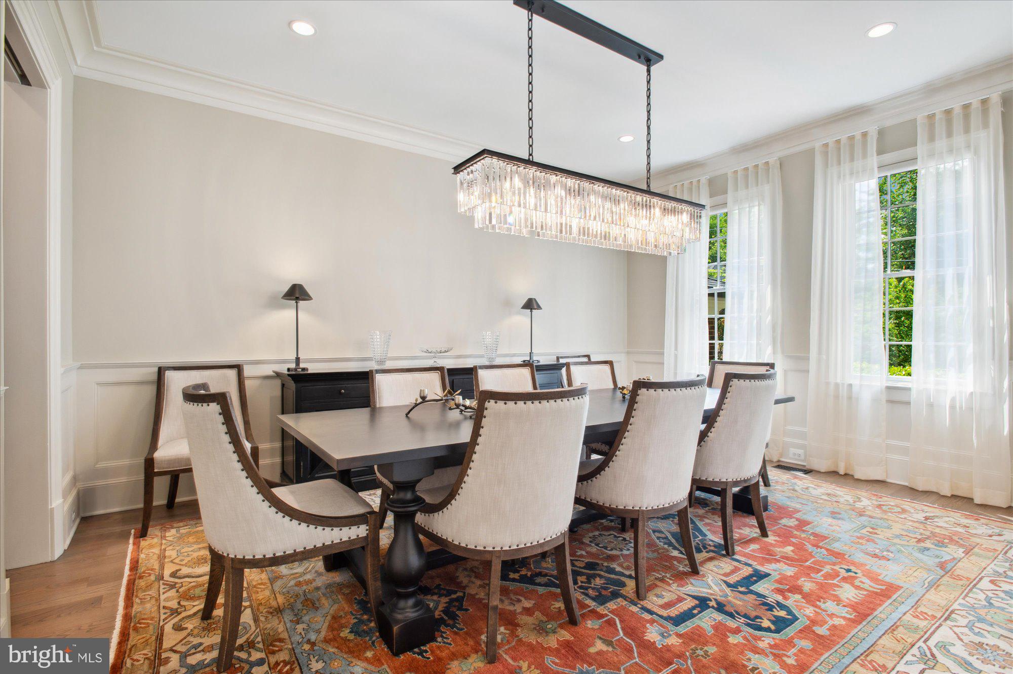 6804 Benjamin Street McLean, VA 22101 - Photo 17 of 68 a view of a dining room with furniture and wooden floor