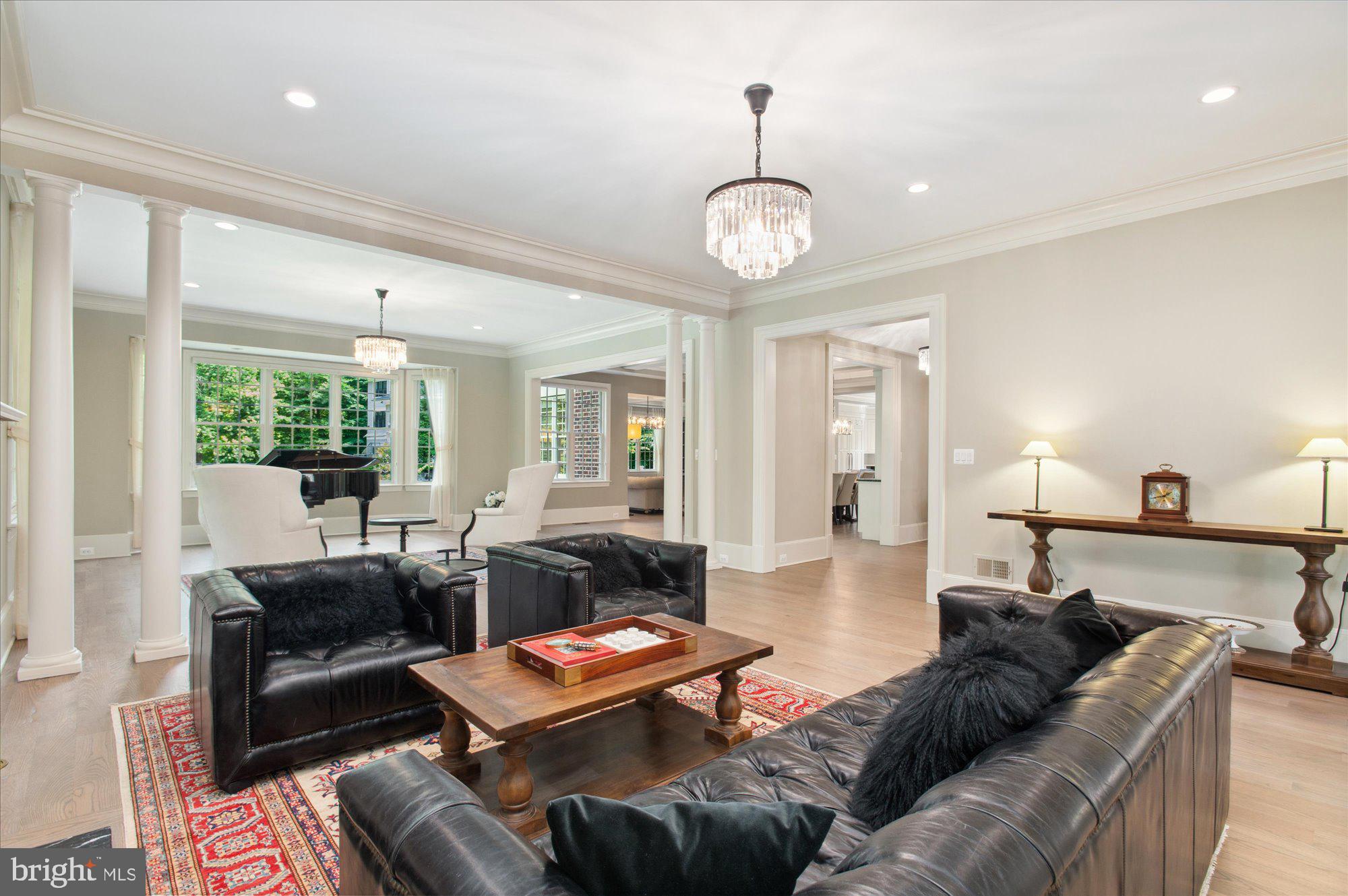 6804 Benjamin Street McLean, VA 22101 - Photo 21 of 68 a living room with furniture kitchen and a large window
