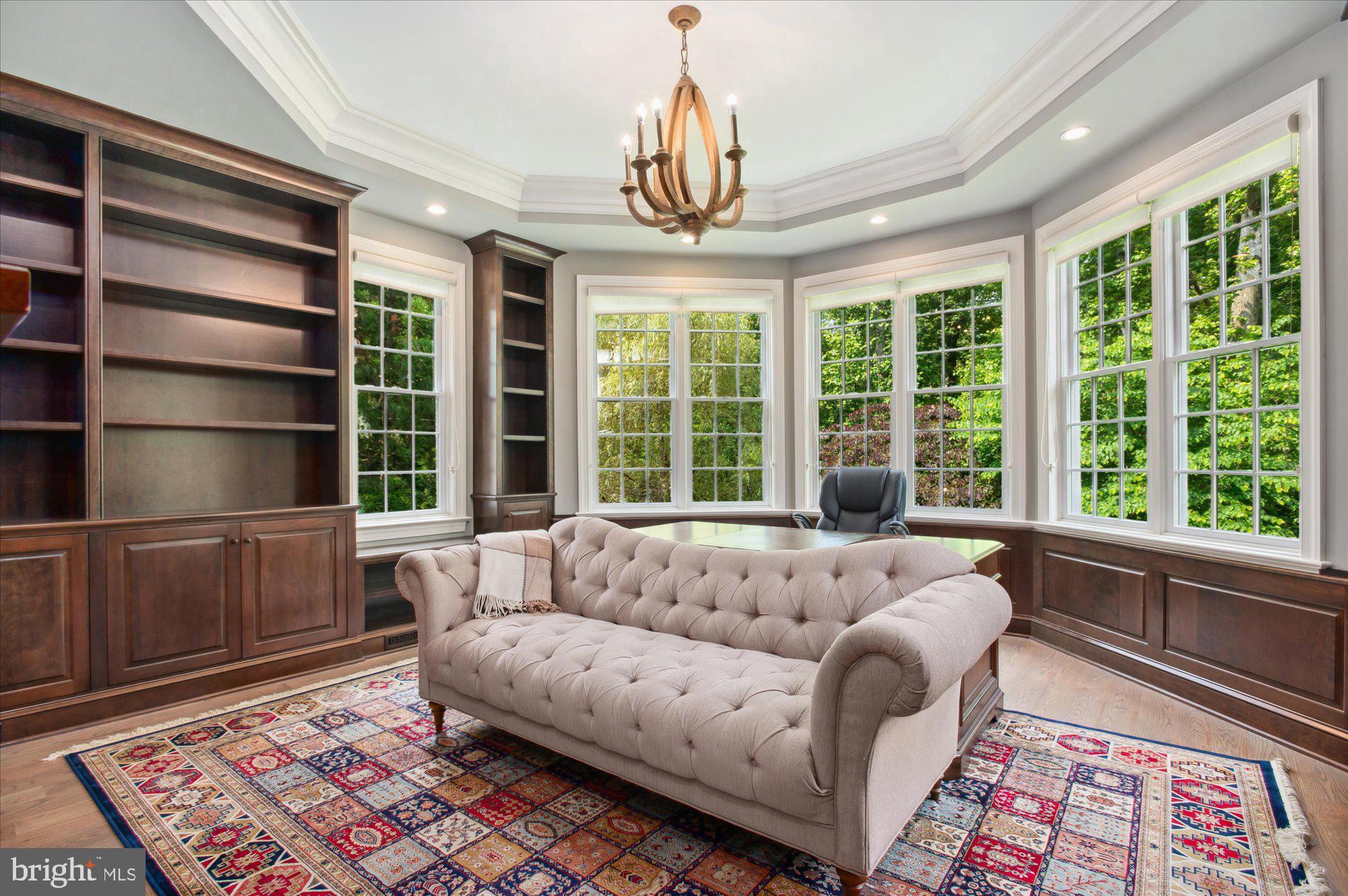6804 Benjamin Street McLean, VA 22101 - Photo 23 of 68 a living room with furniture and a window