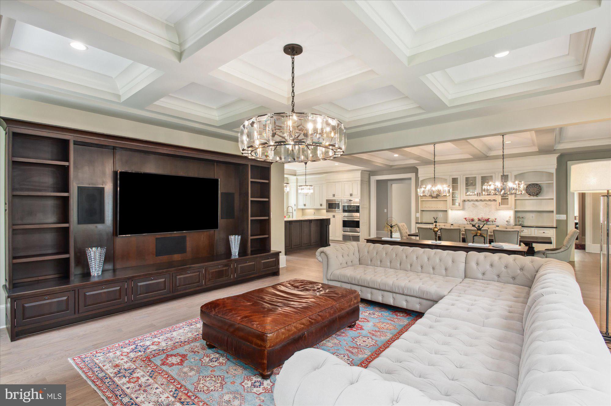 6804 Benjamin Street McLean, VA 22101 - Photo 33 of 68 a living room with furniture and a flat screen tv