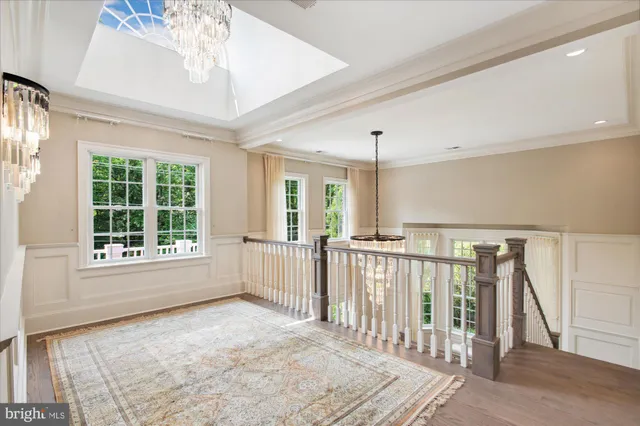 a view of a backyard with table and chairs and potted plants
