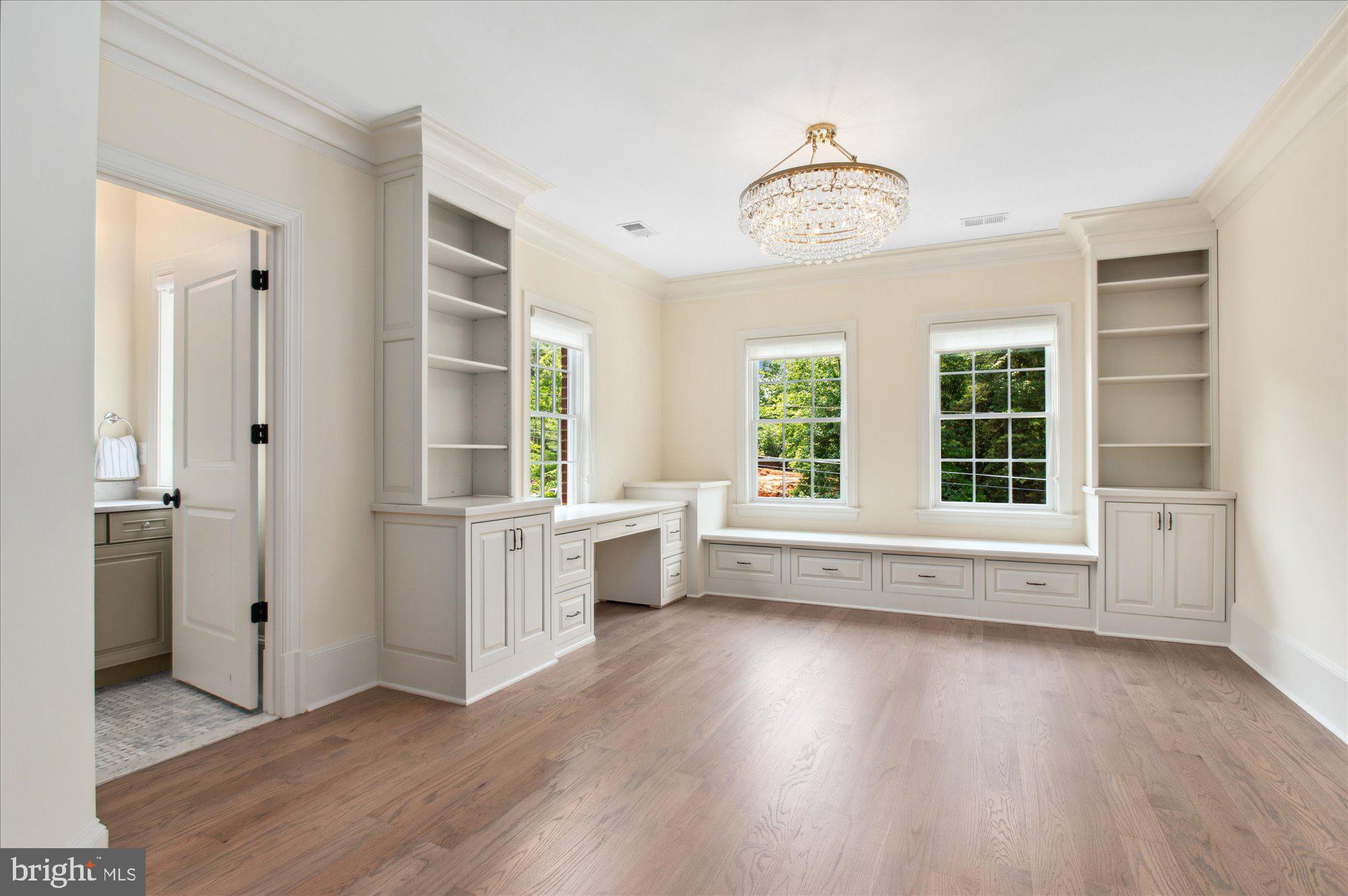 6804 Benjamin Street McLean, VA 22101 - Photo 49 of 68 wooden floor in an empty room with a window