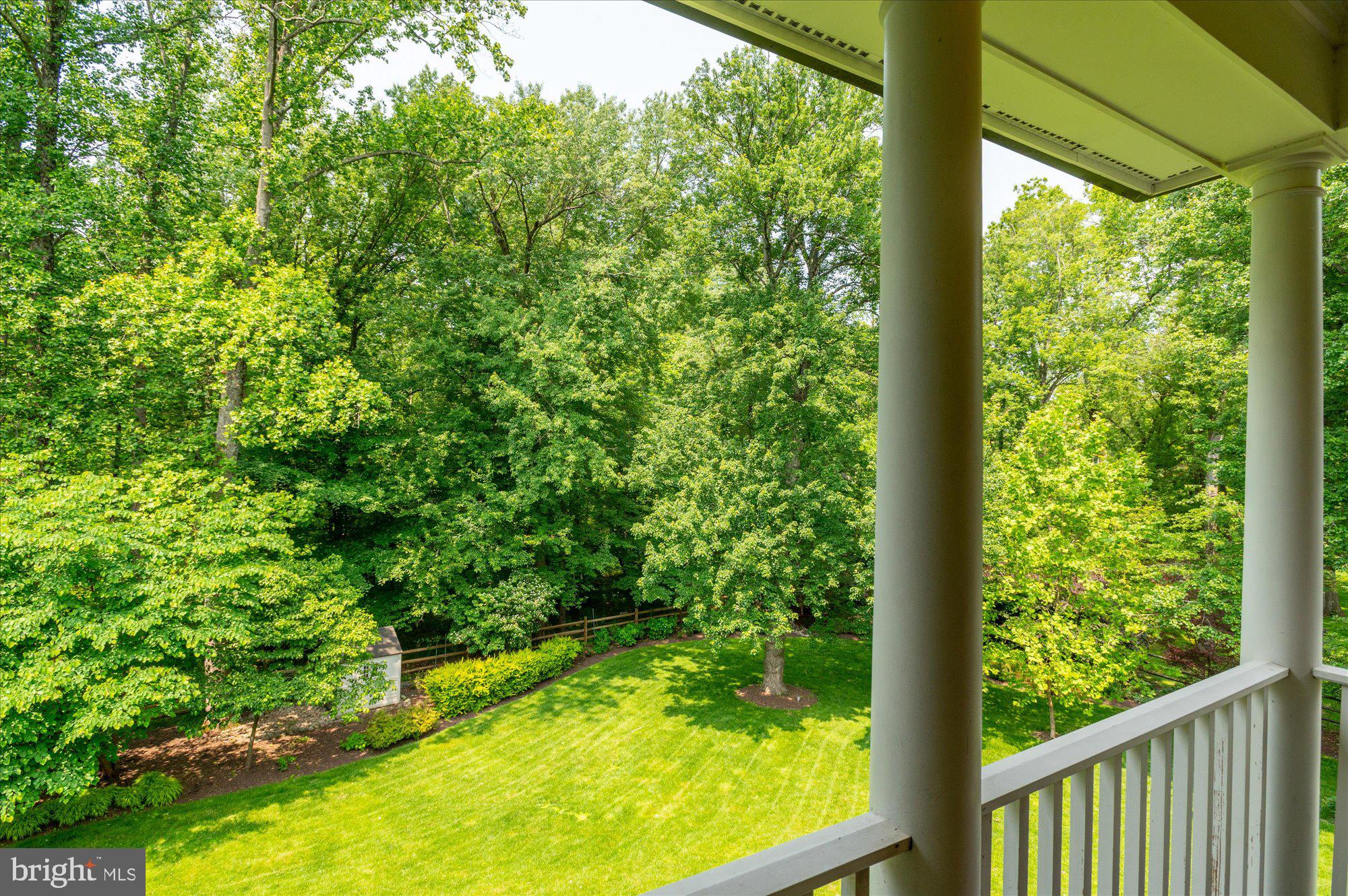 6804 Benjamin Street McLean, VA 22101 - Photo 6 of 68 a view of a garden from a window