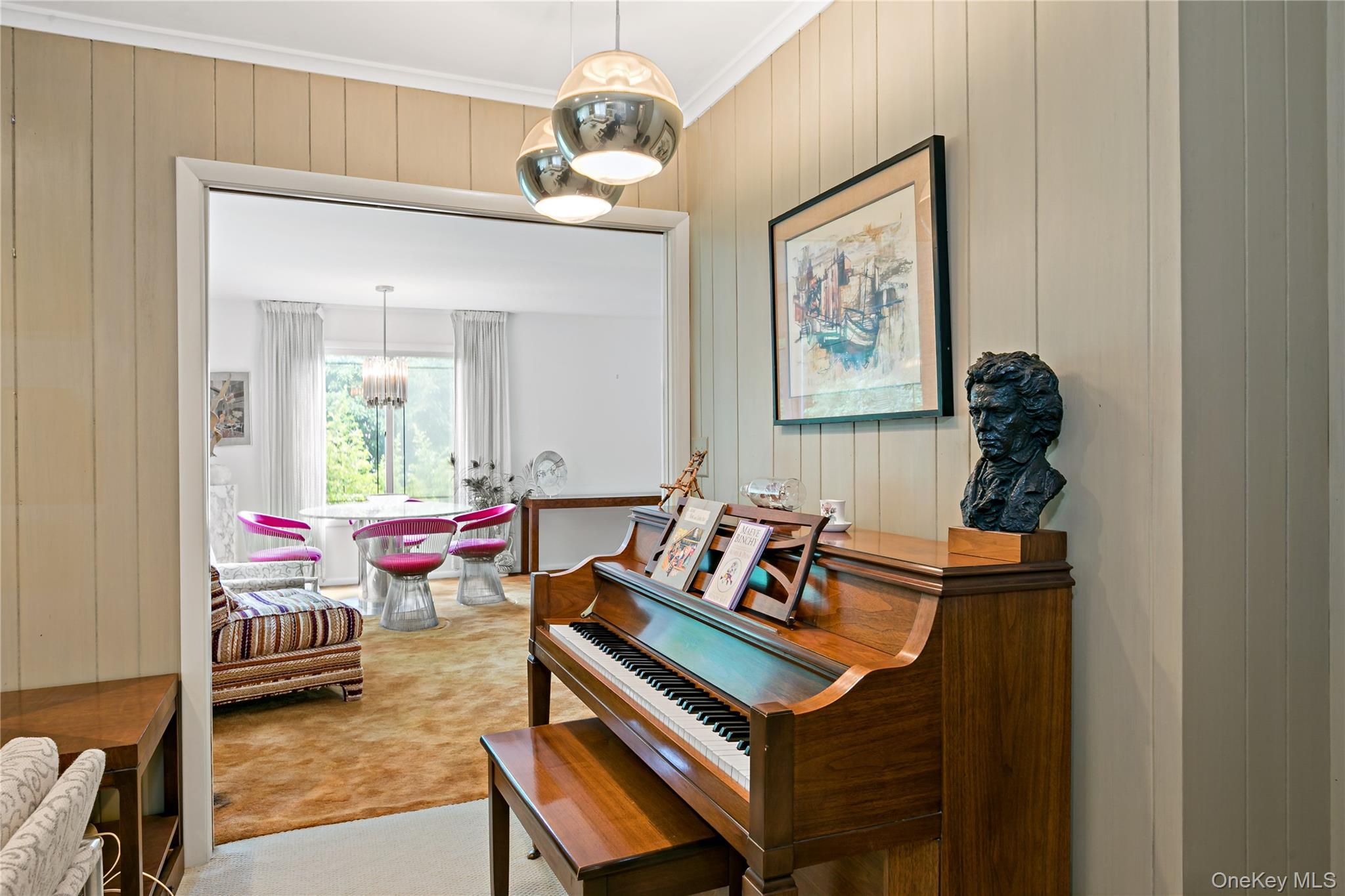 16 Meadow Road Scarsdale, NY 10583 - Photo 9 of 47 a living room with furniture and a chandelier