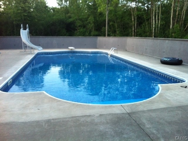 7256 Lewis Road Throop, NY 13021 - Photo 31 of 36 Salt Water Pool