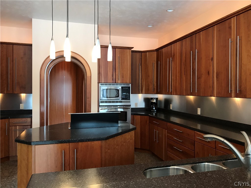 7256 Lewis Road Throop, NY 13021 - Photo 10 of 36 Kitchen with Stainless Steel appliances.
