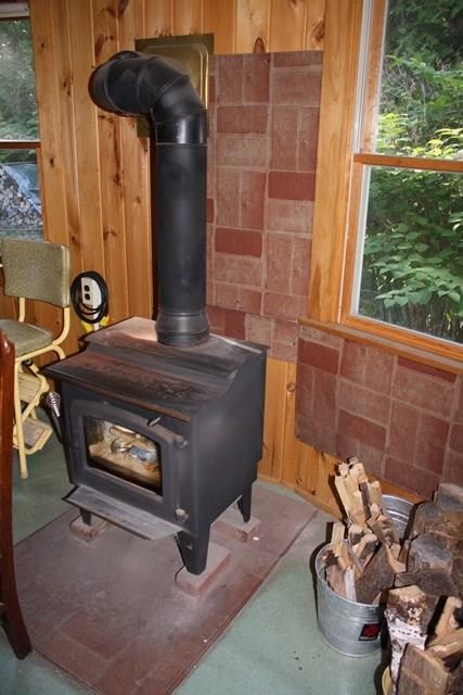 354 Rumford Road Oquossoc, ME 04964 - Photo 14 of 42 Woodstove