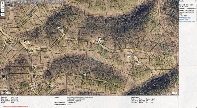 a black and white photo of a green field