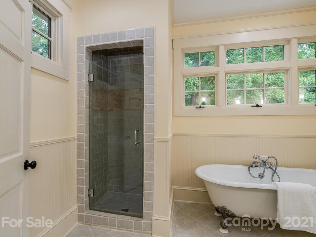 4608 Nora's Path Road Charlotte, NC 28226 - Photo 23 of 39 a bathroom with a sink and a shower