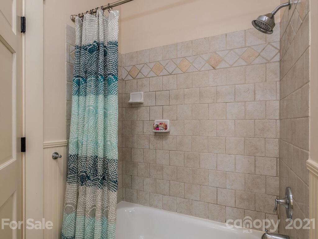 4608 Nora's Path Road Charlotte, NC 28226 - Photo 27 of 39 a bathroom with a shower