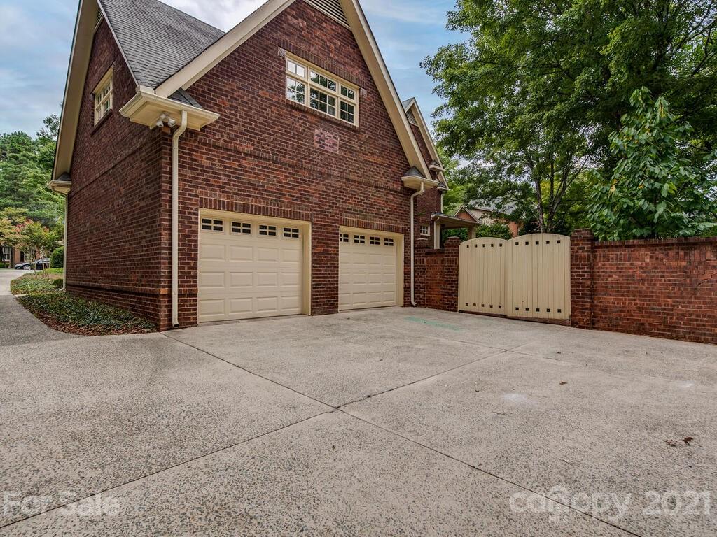 4608 Nora's Path Road Charlotte, NC 28226 - Photo 34 of 39 a view of a parking space in front of a house