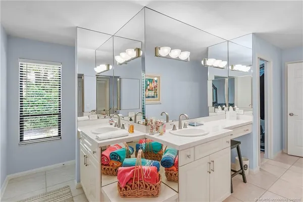 a bathroom with a toilet sink and shower