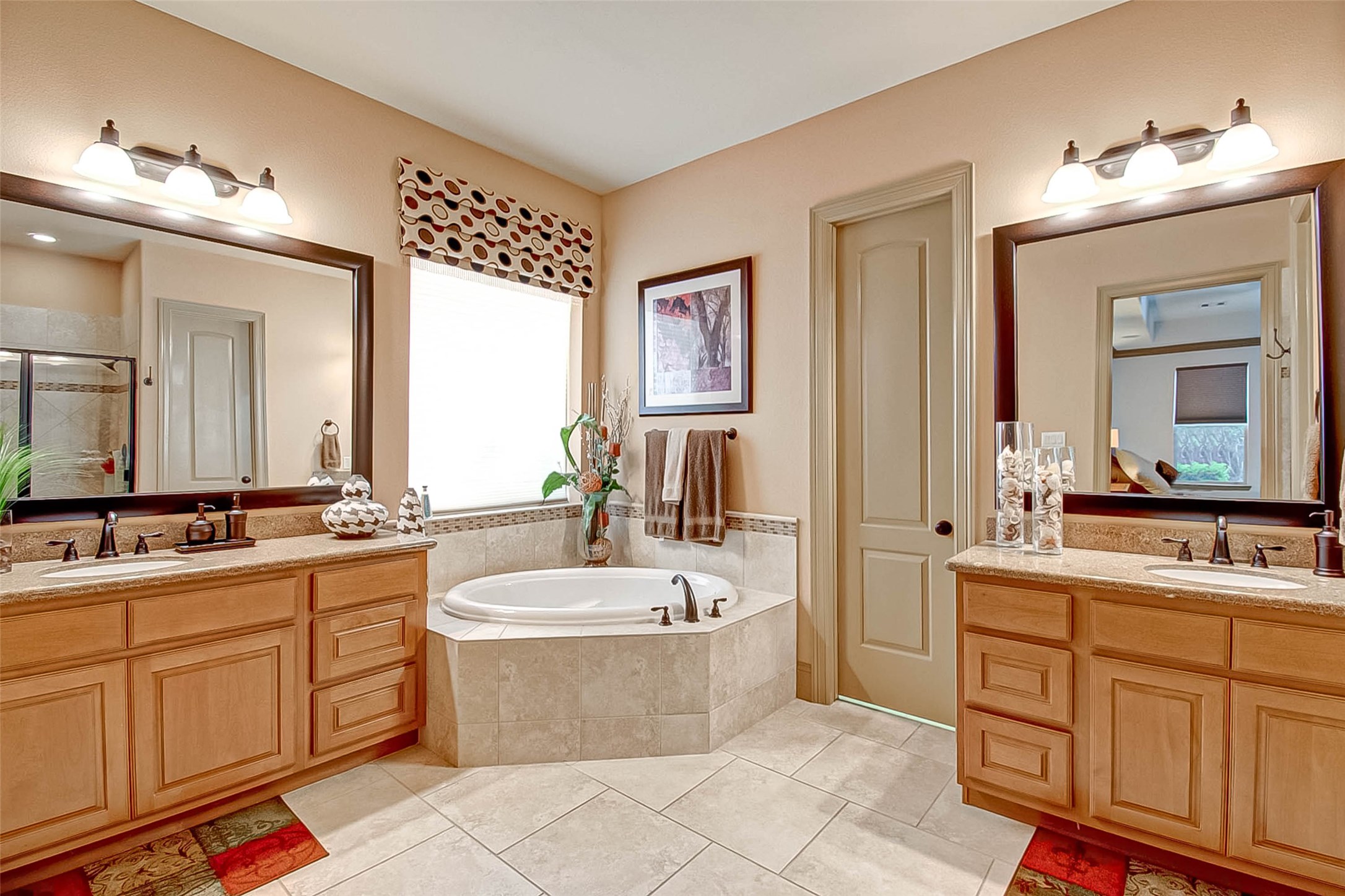 7 Shearling Court Spring, TX 77389 - Photo 35 of 46 a large bathroom with a double vanity sink mirror and bathtub