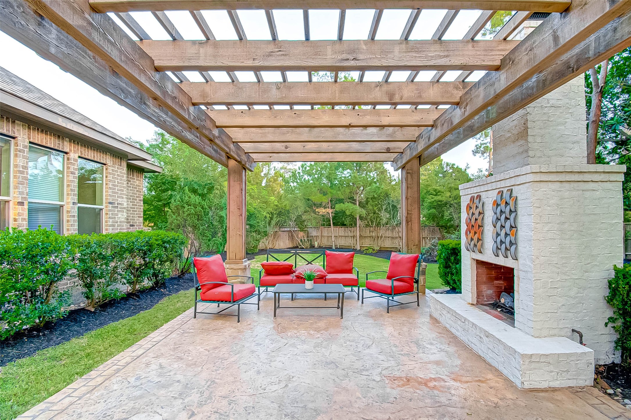 7 Shearling Court Spring, TX 77389 - Photo 42 of 46 a backyard of a house with yard and outdoor seating