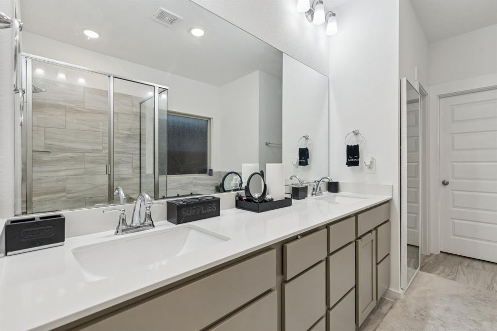1238 Beaumont Lane Red Oak, TX 75154 - Photo 13 of 29 a bathroom with a sink and a mirror